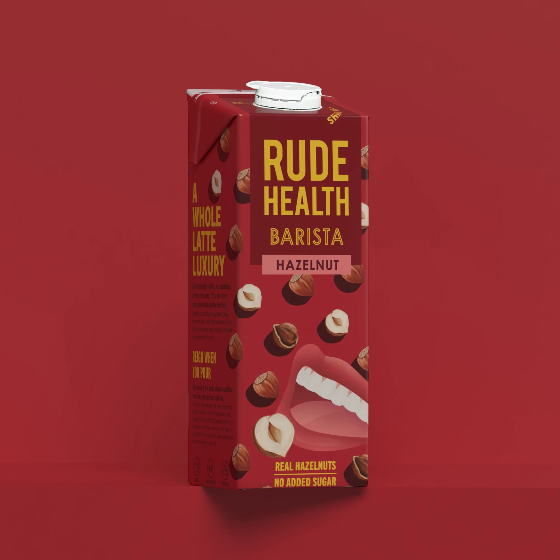 Rude Health Barista Hazelnut packaging on a red background